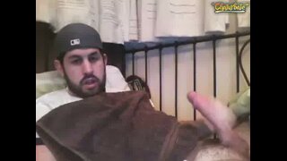 bearded hung guy shoots his load in cam