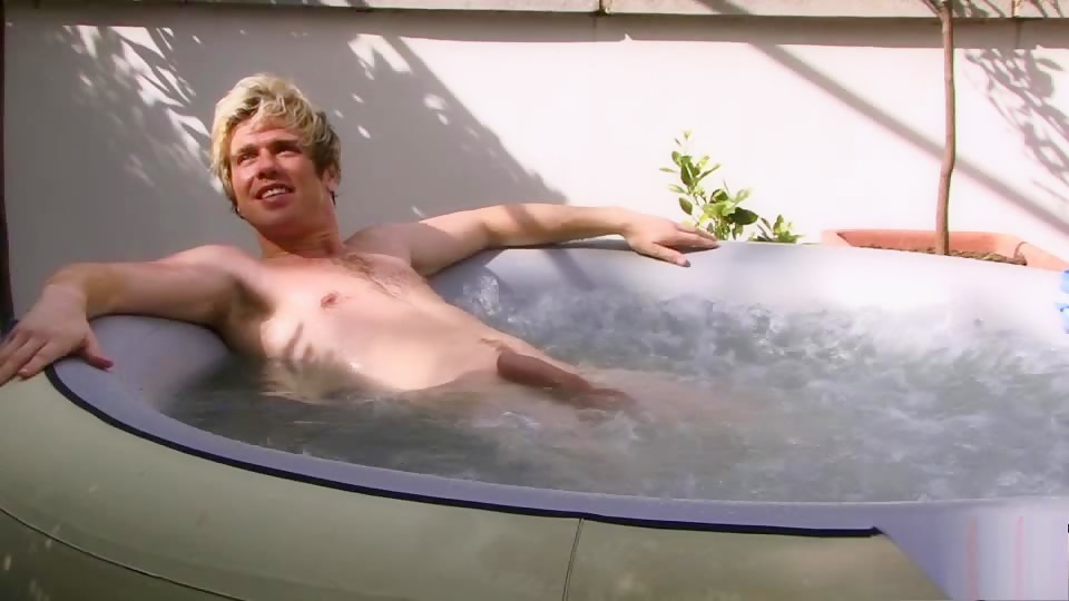 Blond guy takes a bath