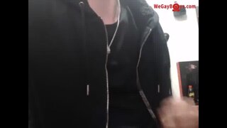 Playing with his big twink cock while watching gay porn