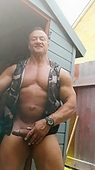 MUSCLE DADDY TEASES AND TUGS HIS MASSIVE COCK