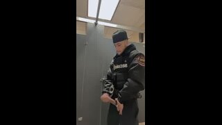Security  Guard  Unloads  His  Weapon